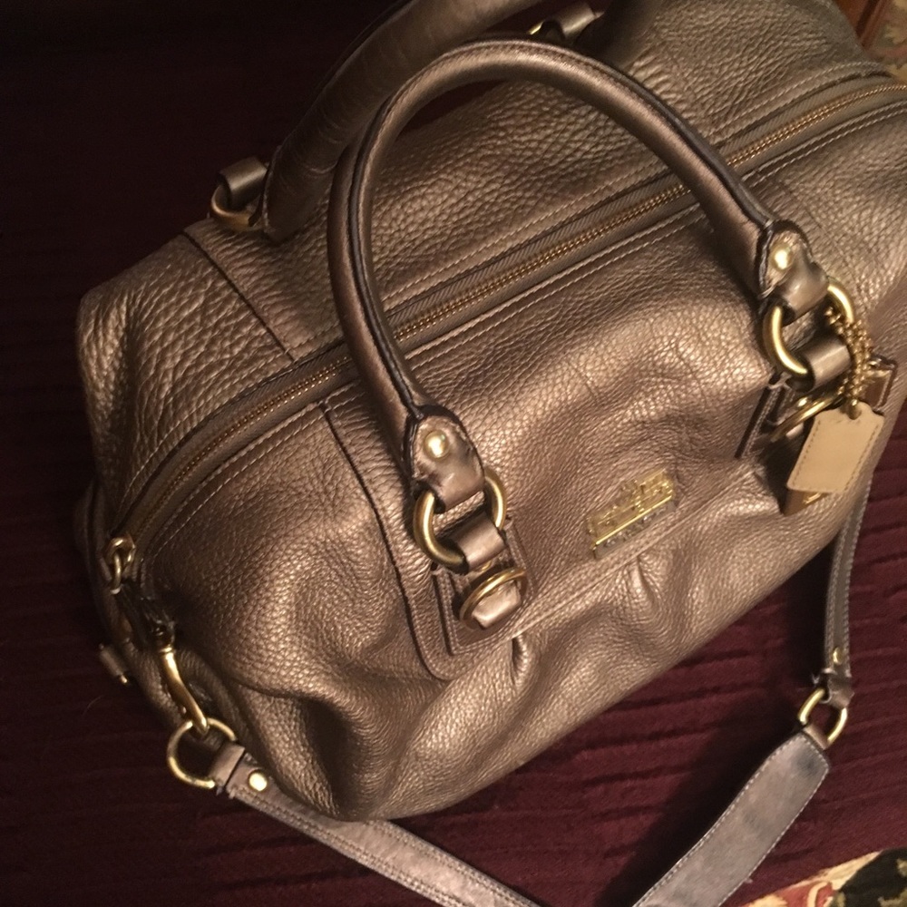 Coach purse satchel converts to hobo bag.
